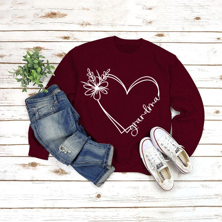 Wine red sweater white font